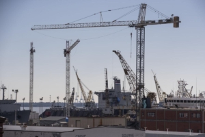 Views of Detyens Shipyard and their working harbor cranes from the roof of Storehouse 9 where a restaurant is planned to be built after renovations of the old Navy Base building in North Charleston on Friday, Jan. 27, 2023